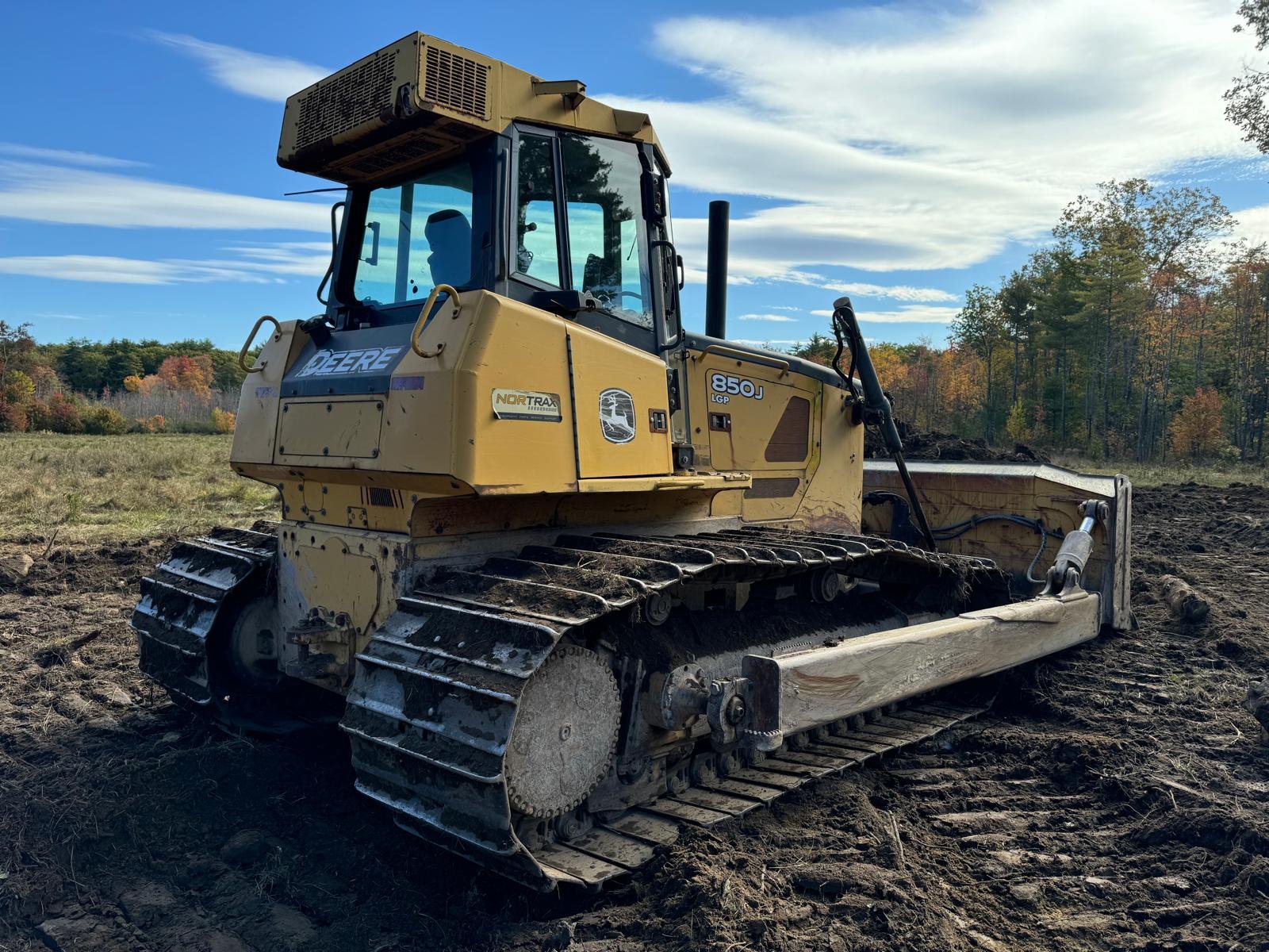 John Deere 850J Bulldozer Moving Earth
